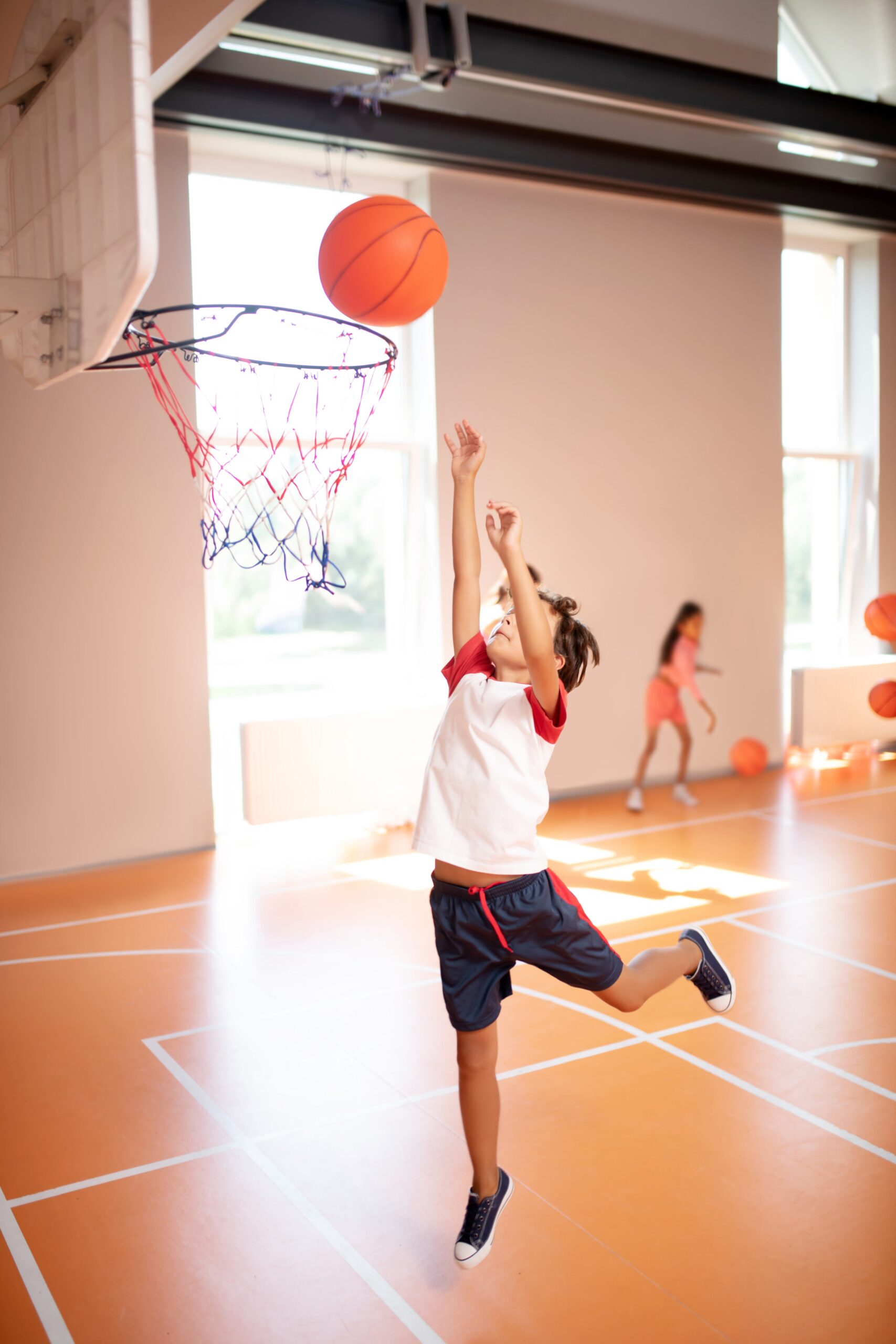 boy-jumping-high-while-training-and-playing-basket-2024-10-18-07-40-57-utc_11zon (1)
